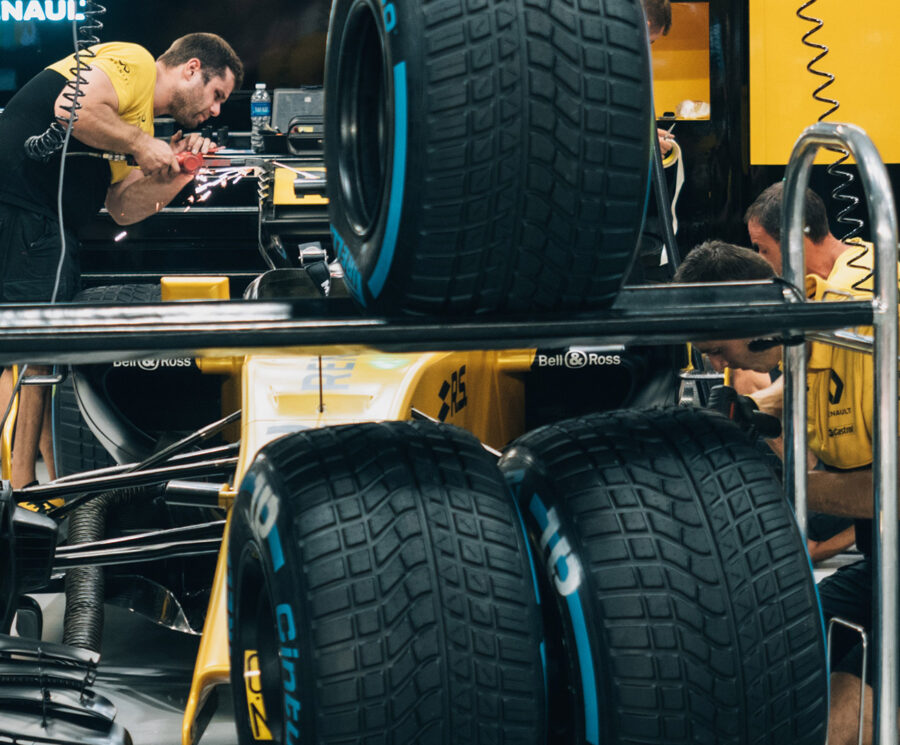 Engineers working on Renault Formula One car