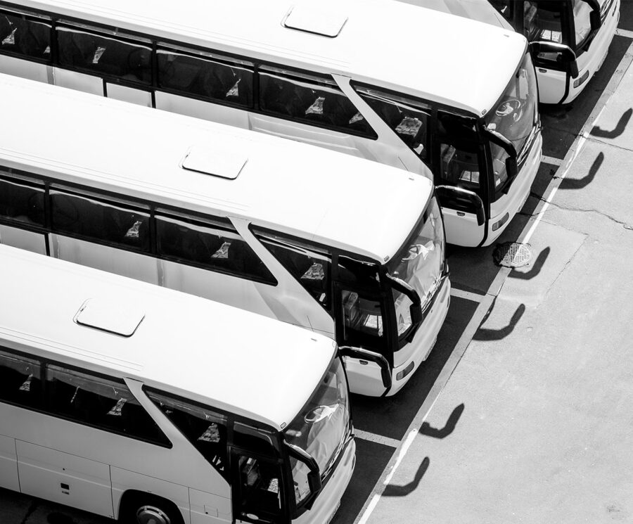 Coaches and buses with air conditioning unit shown on one